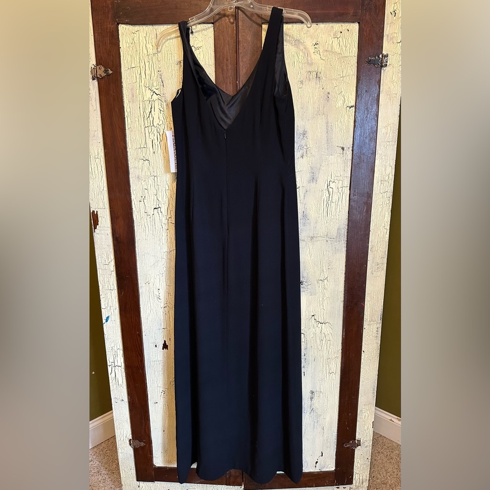 NWT - Long, black, semi-formal dress. Embedded print and back zipper.